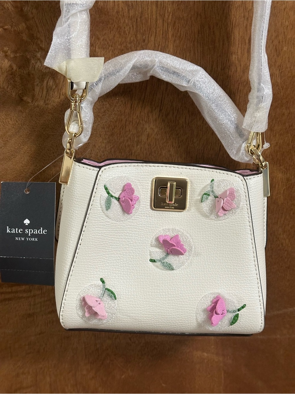 kate spade White Crossbody Bag with Pink Floral Appliqués
